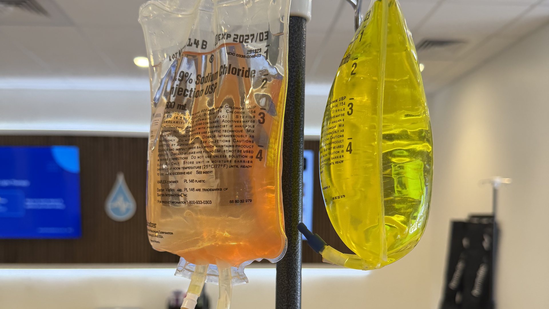 IV bags hanging from a pole in the Hydralive Huntersville lounge