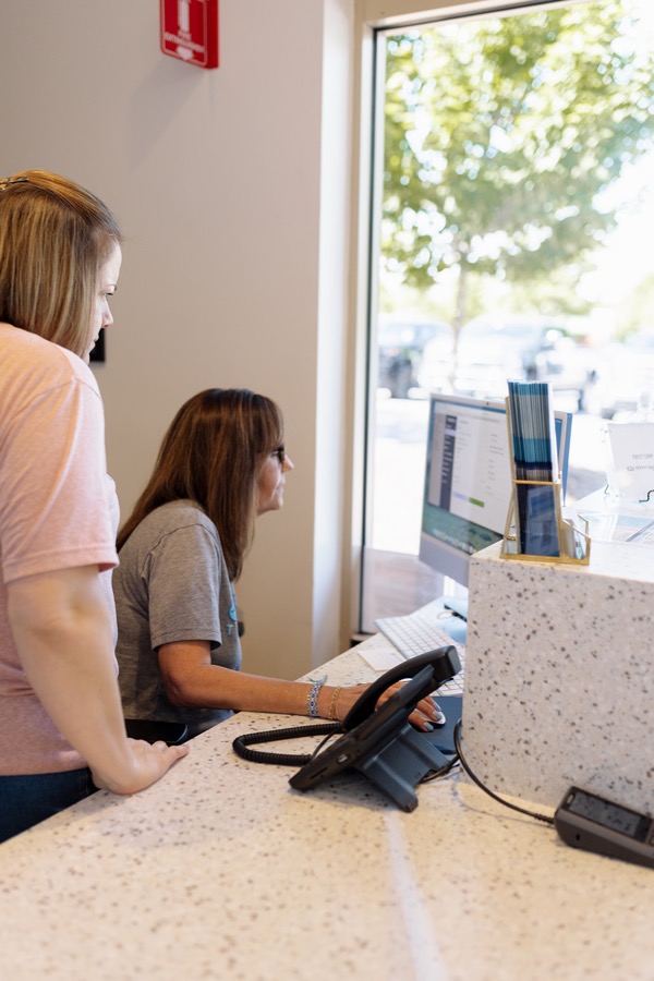 Checking in at the front desk at Hydralive Huntersville