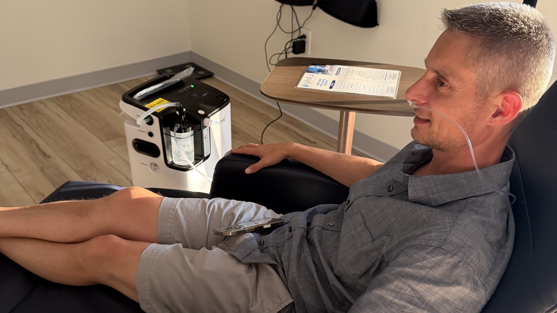 A client relaxing in a treatment chair at Hydralive Huntersville